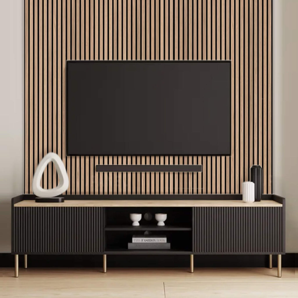 Modern entertainment console with a television mounted on an oak slatwall.