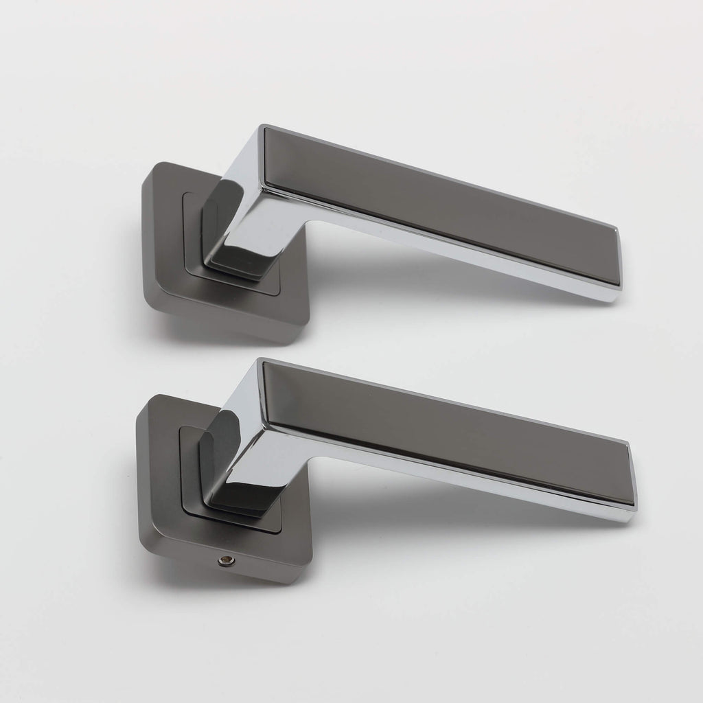 A set of Alto Matt Satin Black & Polished Chrome Square Rose Handles on a white background.