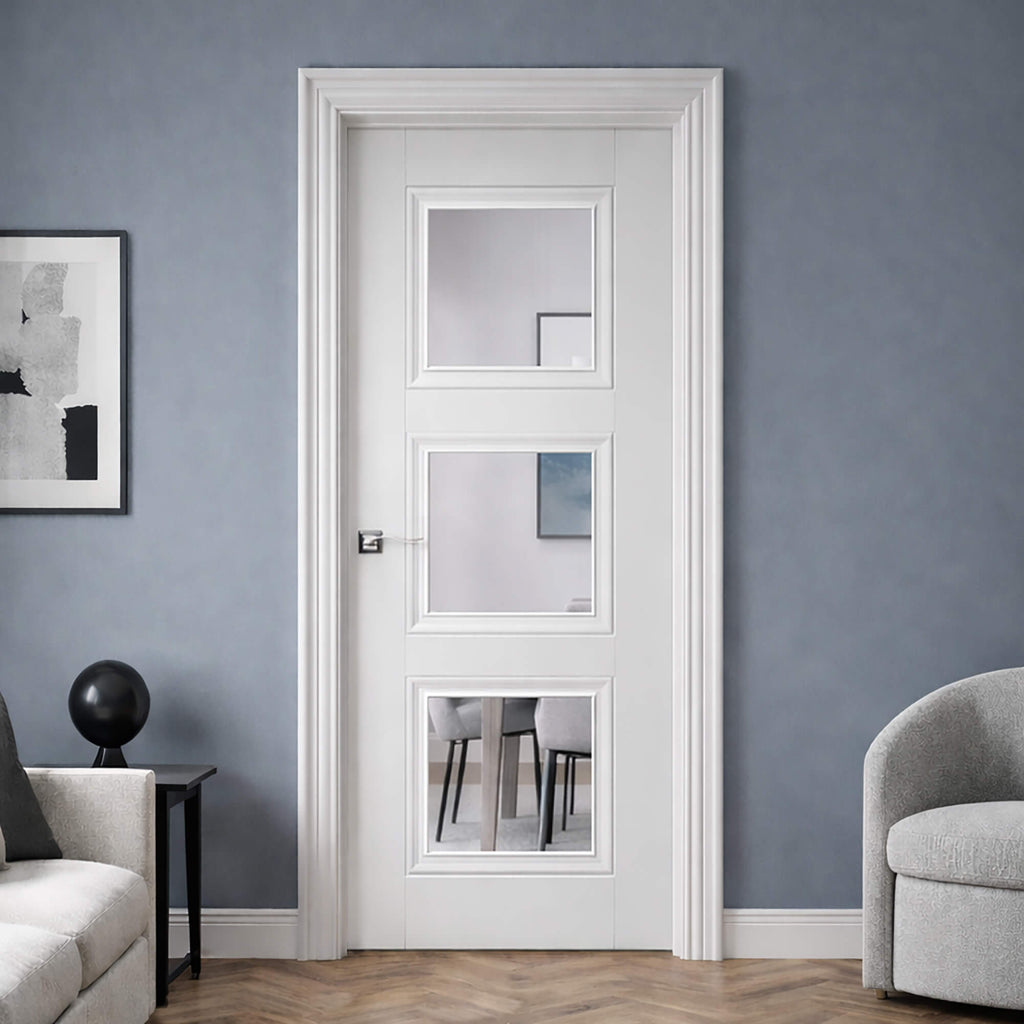 An Amsterdam White Primed 3 Lite 40mm Internal Door in a home living room interior, looking onto a dining room setting.
