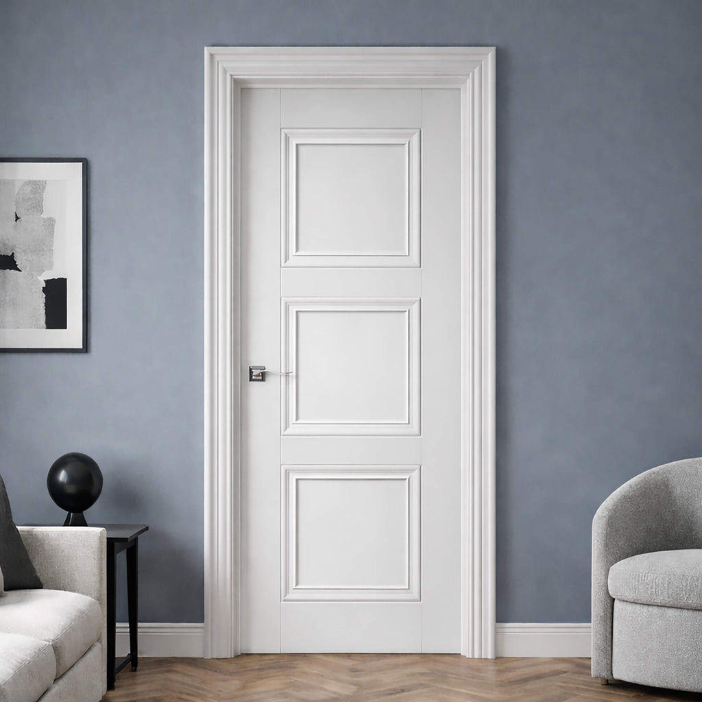 An Amsterdam White Primed 3 Panel 40mm Internal Door in a home interior living room setting in a room with grey walls, furniture, and decor.
