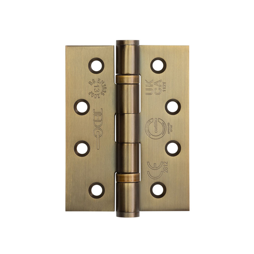 Antique Brass 4" (100mm) Grade 13 Bearing Hinge on a white background