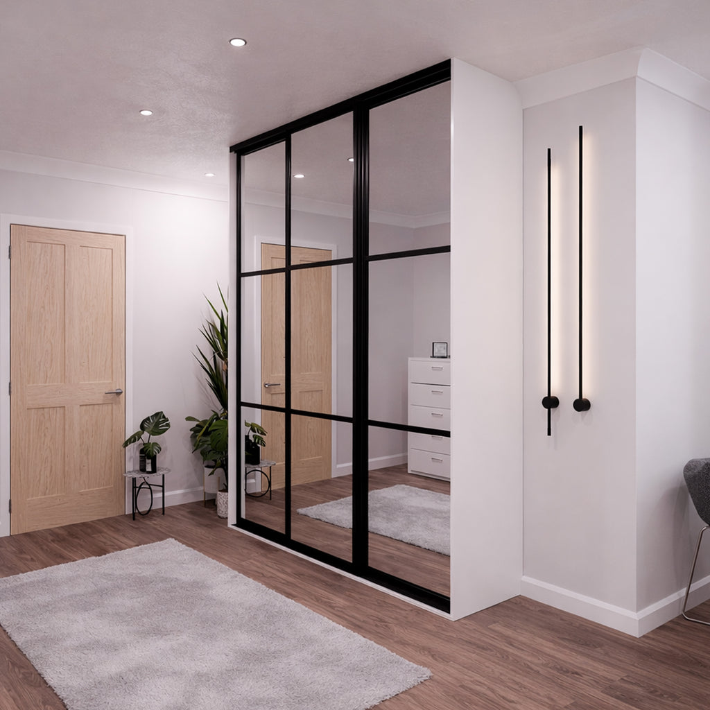 Modern apartment hallway with Black Mirror Doors on a wardrobe, wooden door, and wall-mounted light fixture.