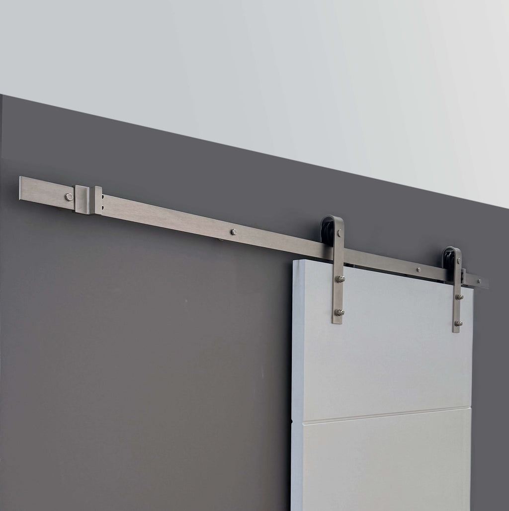 Brushed Steel Barn Door Track in a home interior setting.