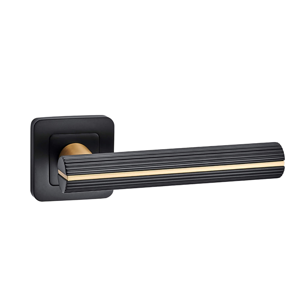 A Calvus Flat Black & Satin Brass Square Rose Handle on a white background