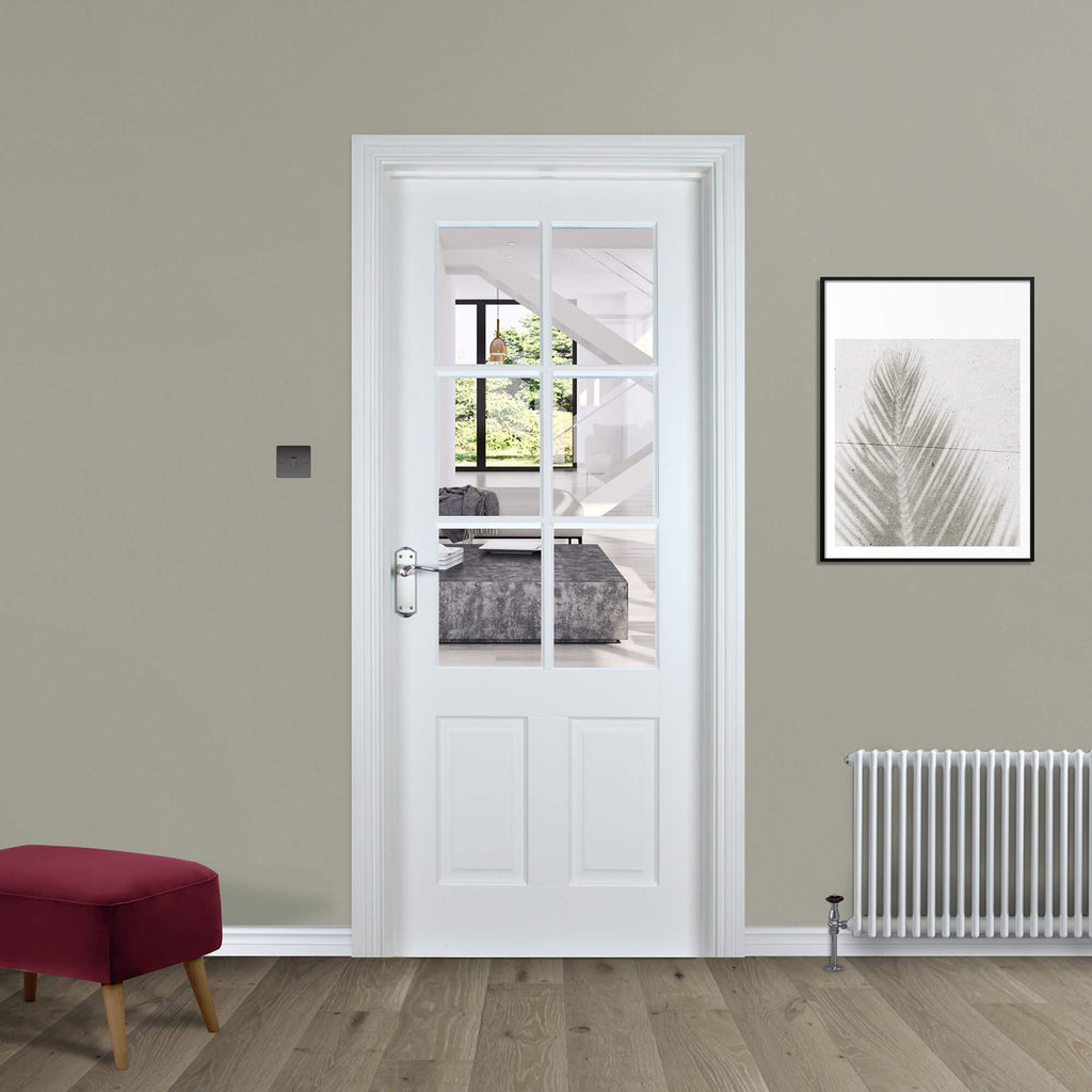 A Cambridge White Primed 6 Lite Pre-glazed 40mm Internal Door in a home setting.
