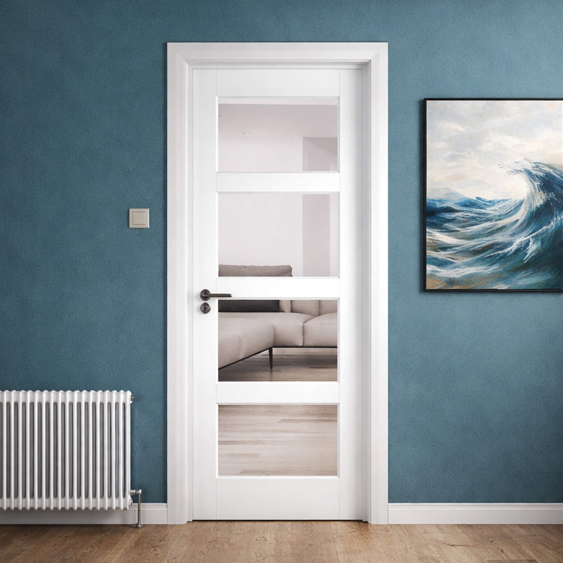 Contemporary White Primed 4 Lite Pre-Glazed 40mm Door with glass panels in a room with blue walls, a radiator, and a painting of a wave.