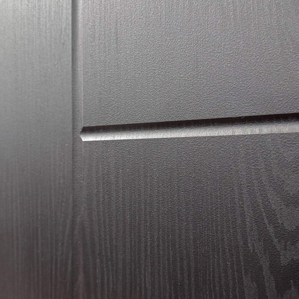Close-up of the grooves and grain on an Iseo Black Ash Laminate 35mm Internal Door 