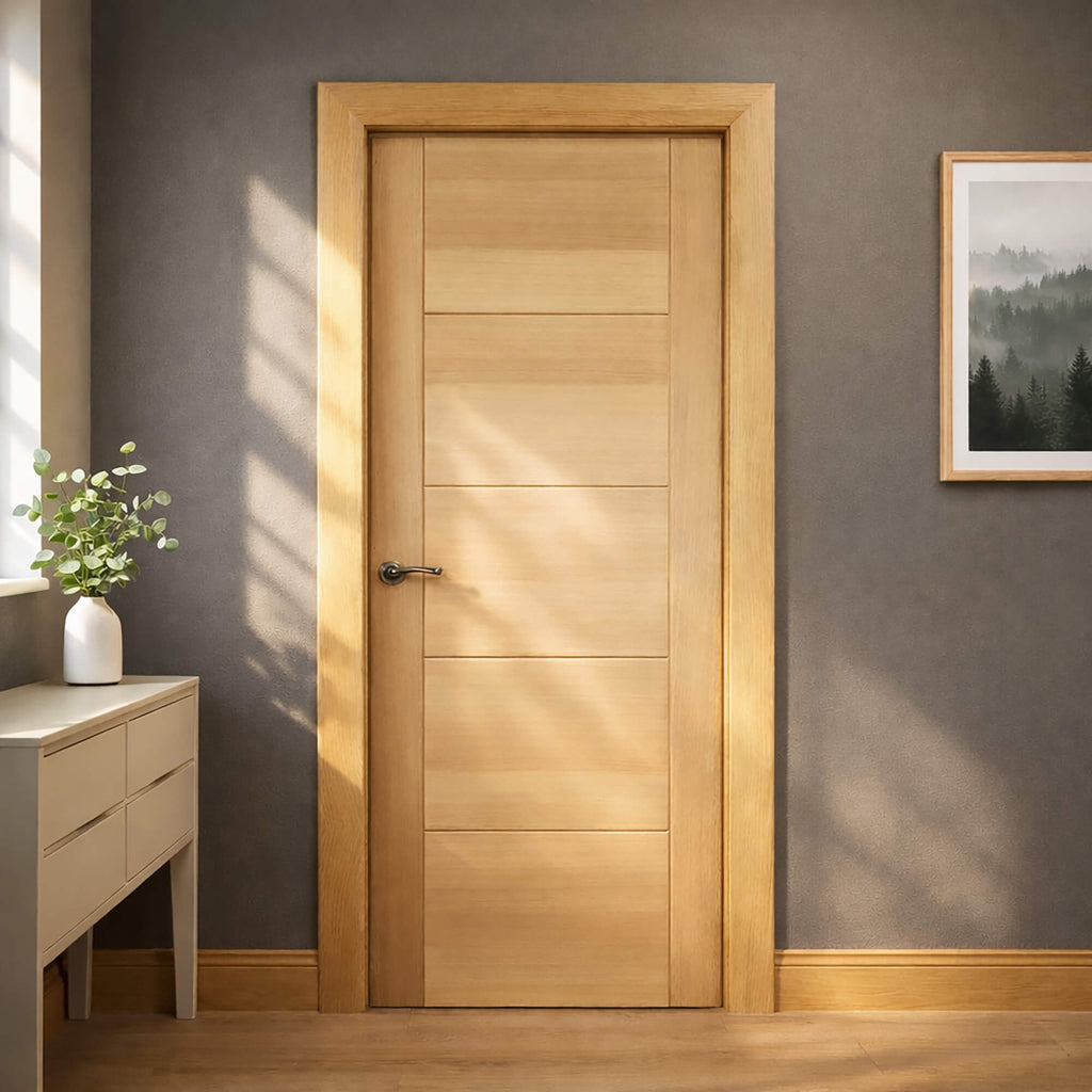 An Iseo White Oak Internal  Door with Oak architrave, in a modern interior setting.