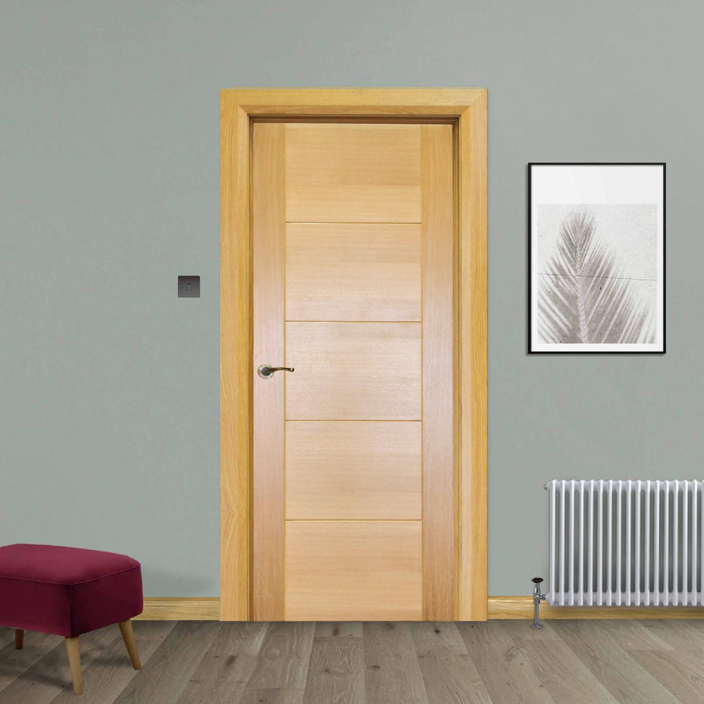 An Iseo White Oak FD30 44mm Internal Fire Door, with a Storm handle, in a home interior setting