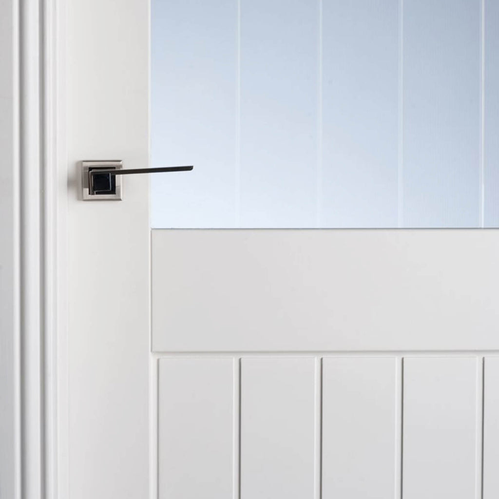 Close-up of a A Mexicano White Primed 1 Lite Pre-Glazed 40mm Internal Door, showing the classic grooves and edges.
