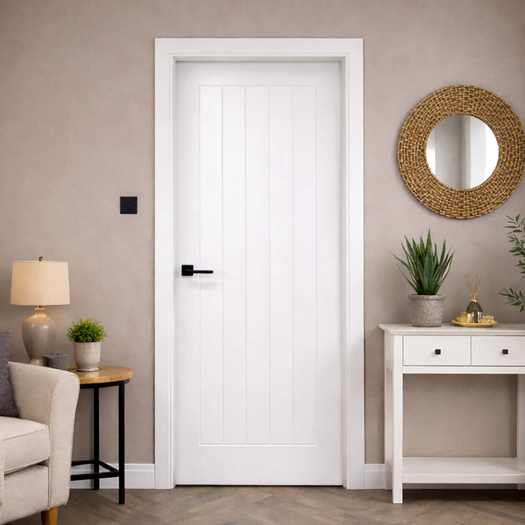 A Mexicano White Primed Paint Grade Internal Door in a home living room setting