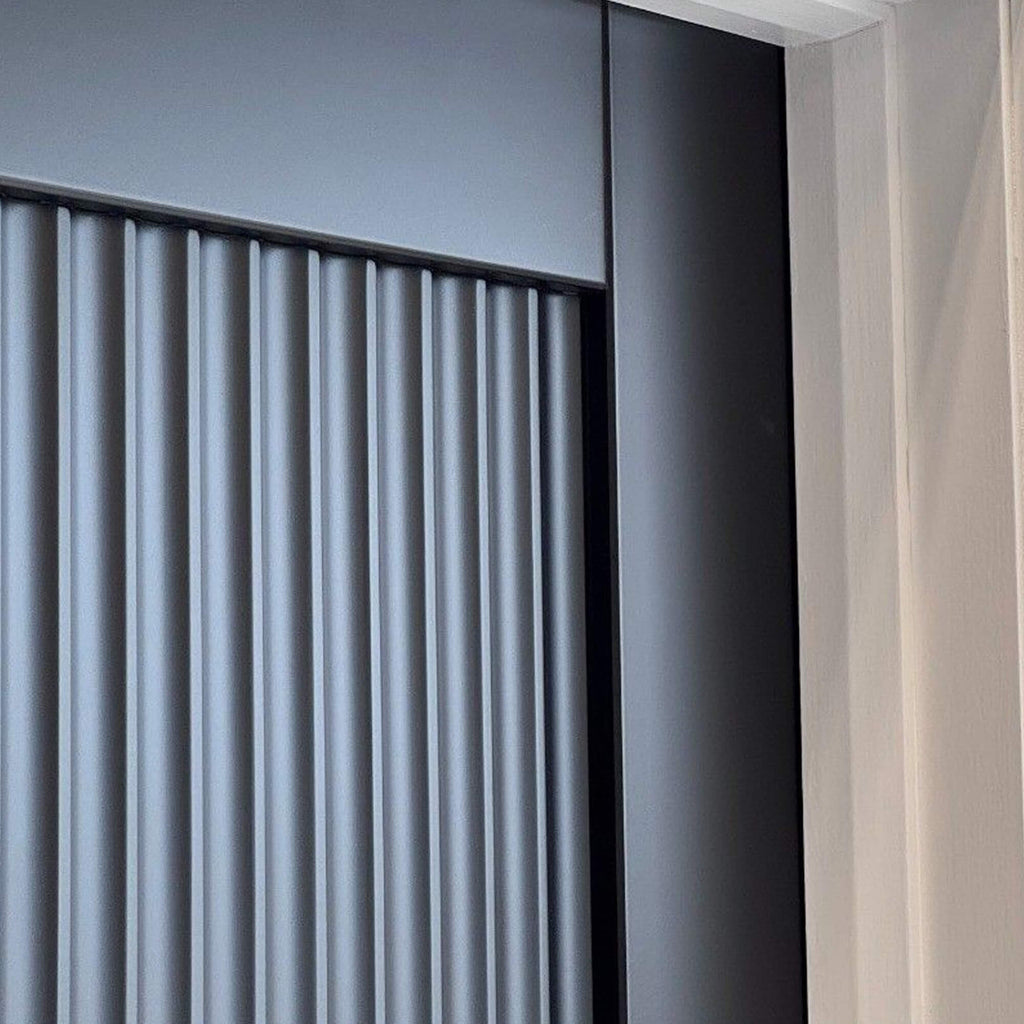 Close-up of a Reeded Black Primer Plus 35mm Internal Door