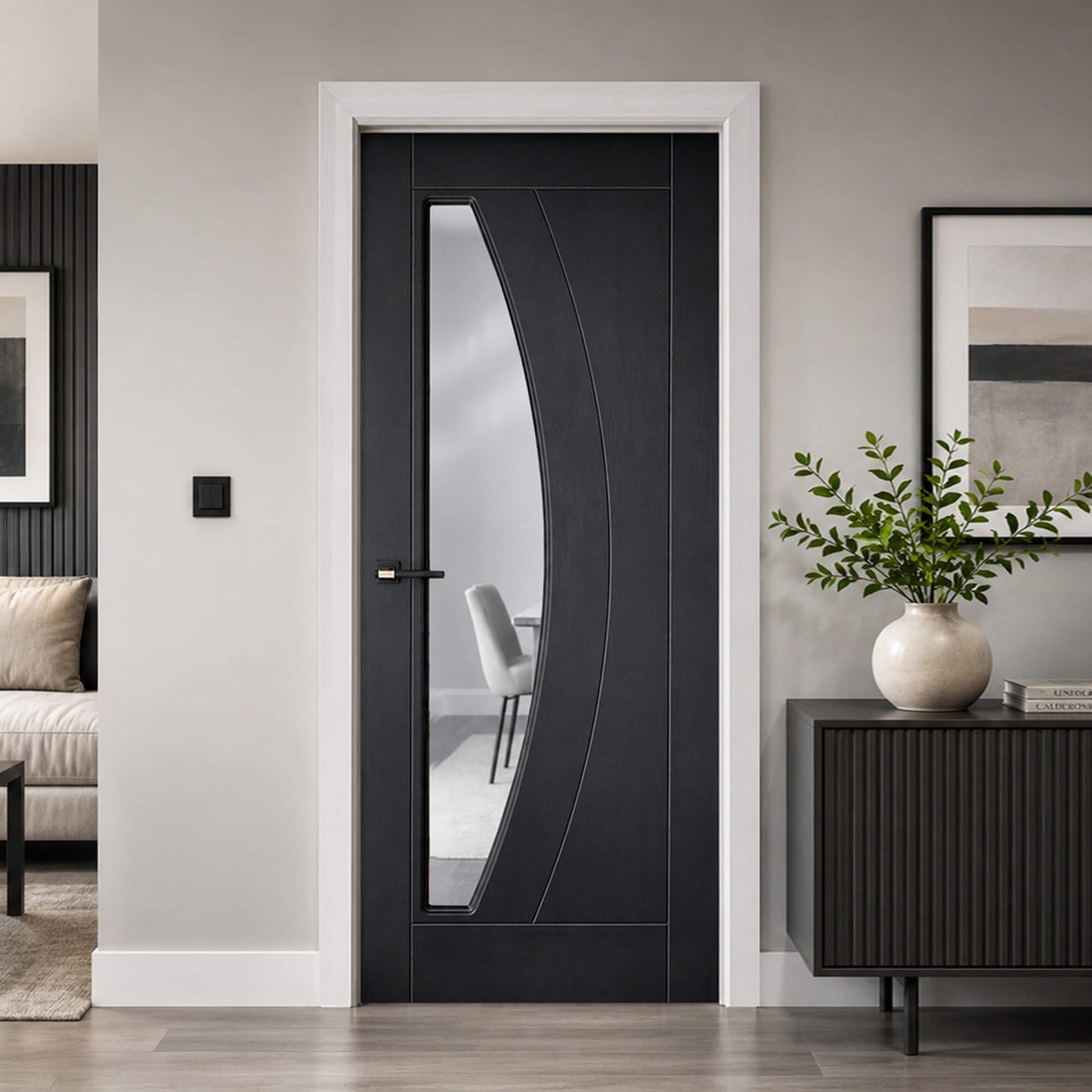 Modern Salerno Black Ash 35mm laminate 1 lite pre-glazed door in a stylish apartment setting.