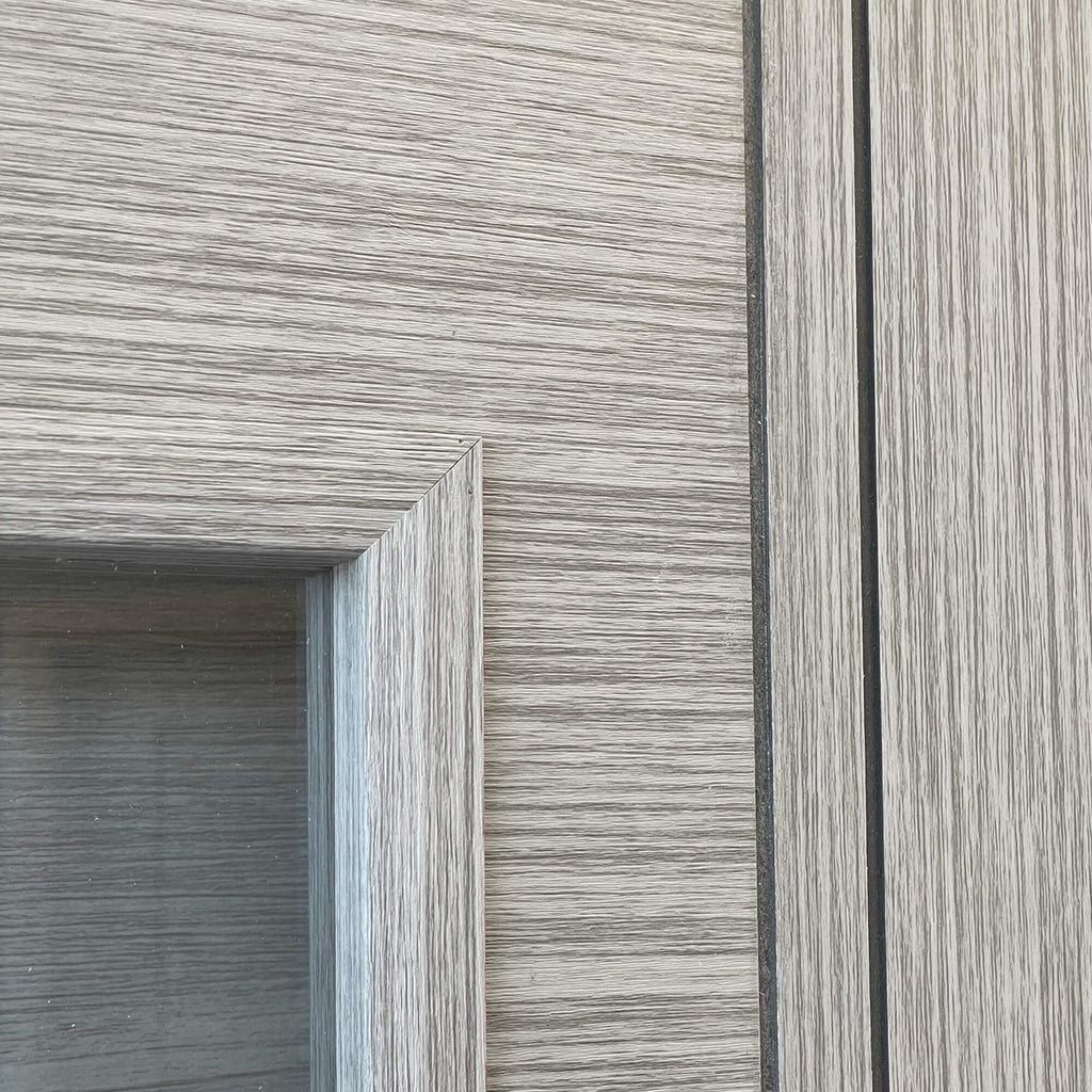 Close-up of the grooves and grain on a Seattle Urban Grey 1 Lite Pre-Glazed 35mm Internal Laminate Door.