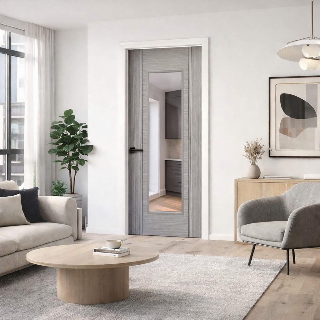 A Seattle Urban Grey 1 Lite 35mm Pre-Glazed Laminate Door in a modern living room interior setting.