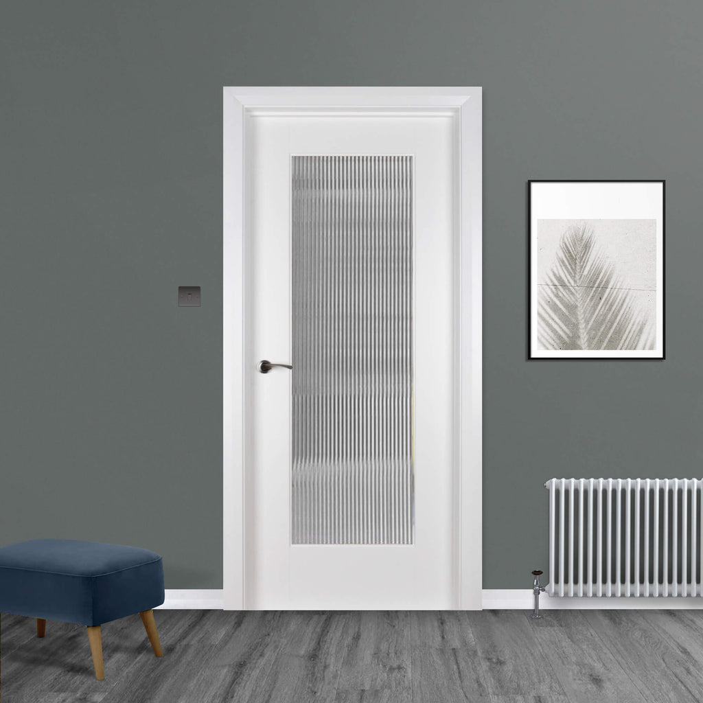 A Shaker White Primed 1 Lite Unglazed Door with Reeded glazed panel (optional extra) installed in a interior setting.