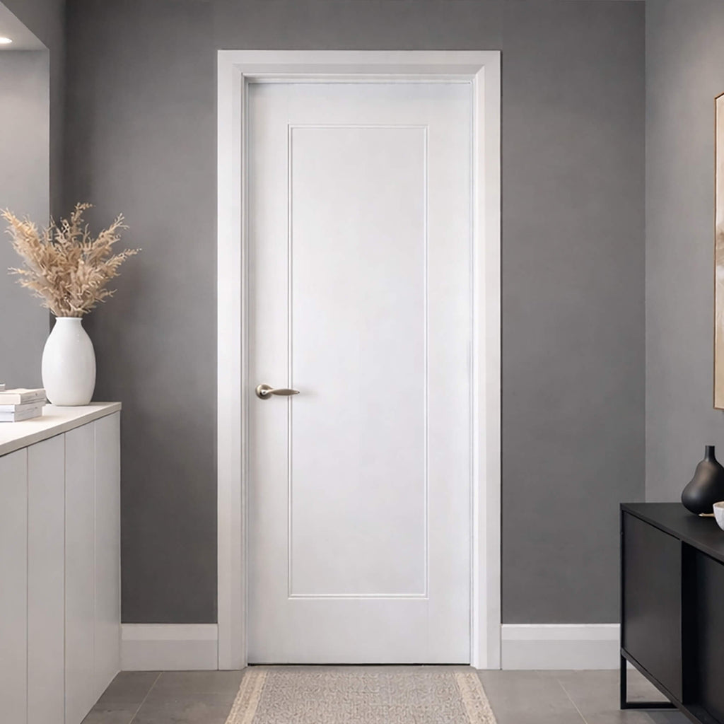 A Shaker White Primed 1 Panel 40mm Internal Door in a hallway setting with grey walls, a vase, and a cabinet.
