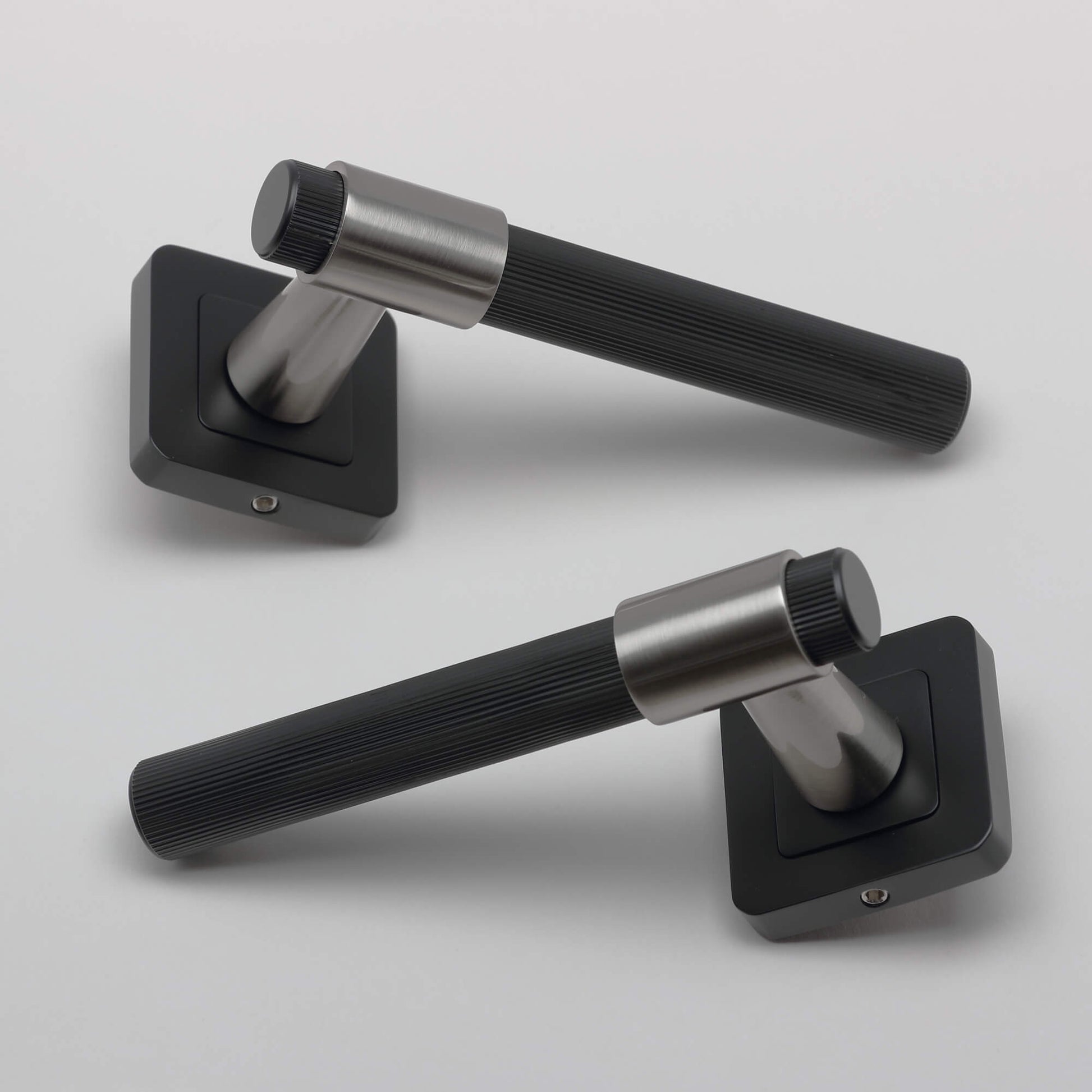 Pair of A Stratus Flat Black & Nickel Brushed Square Rose Handle on a light grey background.