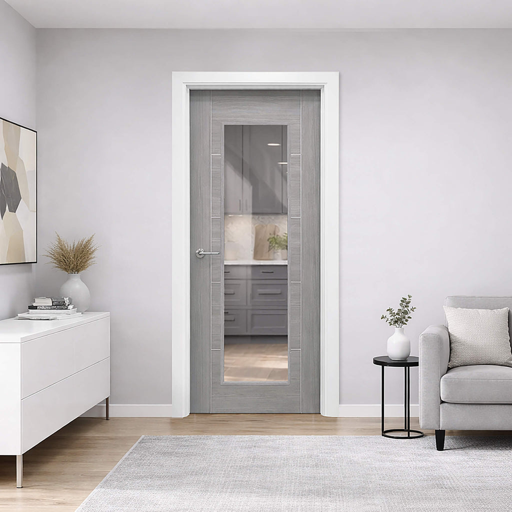 A Tigris Lava Grey 1 Lite Unglazed 40mm Internal Laminate Door, with a Storm handle and 4mm clear toughened glass, in a home living room setting.
