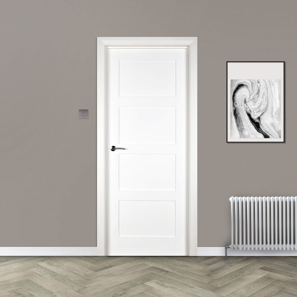 A Trade Spec White Primed Contemporary 4 Panel 40mm Internal Door in a home setting