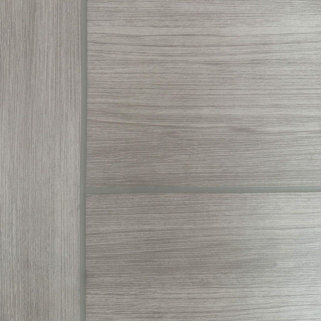 Close-up of the grooves and wood grain on a Vancouver Stone Grey 40mm Internal Laminate Door.